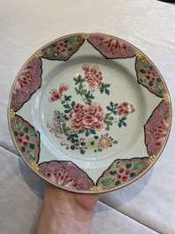 Two sets of six Chinese famille rose plates with peonies, Yongzheng/Qianlong