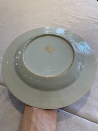 Two sets of six Chinese famille rose plates with peonies, Yongzheng/Qianlong