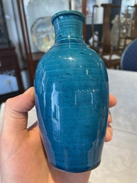 Three Chinese turquoise-glazed vases and a turquoise and aubergine-glazed Buddhist lion, Kangxi