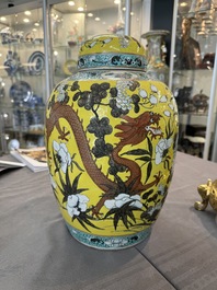 A large Chinese yellow-ground Dayazhai-style 'dragons' jar and cover on gilt bronze stand, 19th C.