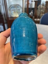 Three Chinese turquoise-glazed vases and a turquoise and aubergine-glazed Buddhist lion, Kangxi