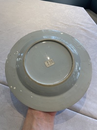 Two sets of six Chinese famille rose plates with peonies, Yongzheng/Qianlong