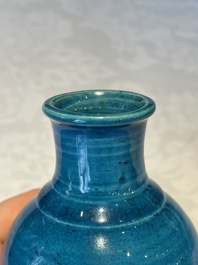 Three Chinese turquoise-glazed vases and a turquoise and aubergine-glazed Buddhist lion, Kangxi