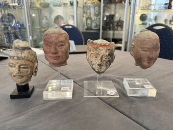 A varied collection of eight pottery, stone and stucco fragments, Asia, 2nd C. B.C. and later
