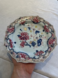 Two sets of six Chinese famille rose plates with peonies, Yongzheng/Qianlong