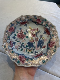 Two sets of six Chinese famille rose plates with peonies, Yongzheng/Qianlong