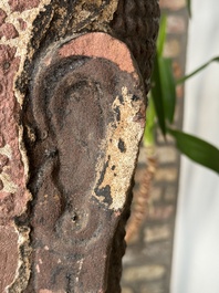 A Thai red sandstone head of Buddha, possibly Ayutthaya period, 15th C.