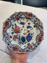Two sets of six Chinese famille rose plates with peonies, Yongzheng/Qianlong