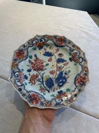 Two sets of six Chinese famille rose plates with peonies, Yongzheng/Qianlong