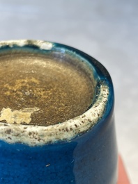Three Chinese turquoise-glazed vases and a turquoise and aubergine-glazed Buddhist lion, Kangxi