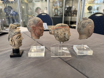 A varied collection of eight pottery, stone and stucco fragments, Asia, 2nd C. B.C. and later