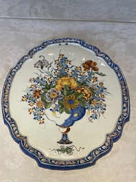 A fine polychrome Dutch Delft 'flower vase' plaque, 18th C.