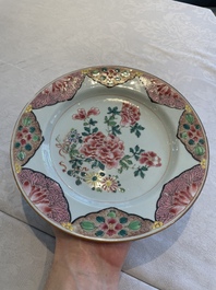 Two sets of six Chinese famille rose plates with peonies, Yongzheng/Qianlong
