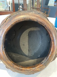 A Chinese agarwood brush washer with landscape relief design on wooden stand, 17/18th C.