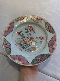 Two sets of six Chinese famille rose plates with peonies, Yongzheng/Qianlong