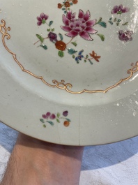 A collection of 22 Chinese famille rose and Imari-style plates, 18th C.