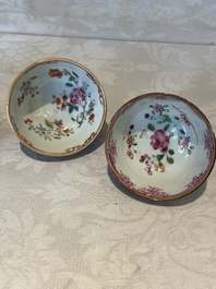 Two Chinese famille rose teapots, ten cups and nine saucers, Qianlong