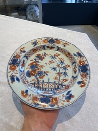 A collection of 22 Chinese famille rose and Imari-style plates, 18th C.