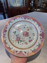 A group of thirteen Chinese blue, white and famille rose plates and a bowl, late Ming/early Qing