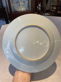 A group of thirteen Chinese blue, white and famille rose plates and a bowl, late Ming/early Qing