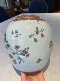 A pair of fine Chinese famille rose 'botanical Merian-style' jars with wooden covers, Qianlong
