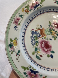 A collection of 22 Chinese famille rose and Imari-style plates, 18th C.