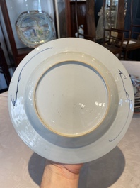 A group of thirteen Chinese blue, white and famille rose plates and a bowl, late Ming/early Qing