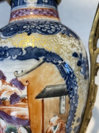 A pair of Chinese Canton famille rose 'mandarin subject' vases with gilt bronze mounts, Qianlong