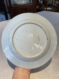 A group of thirteen Chinese blue, white and famille rose plates and a bowl, late Ming/early Qing