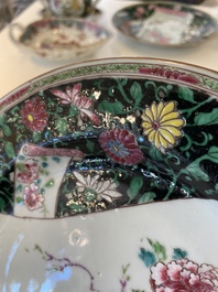 A pair of Chinese famille rose black-ground 'flowers and scrolls' plates, Yongzheng/Qianlong