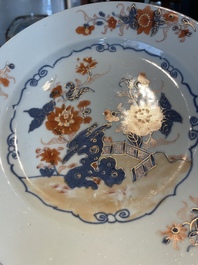 A group of thirteen Chinese blue, white and famille rose plates and a bowl, late Ming/early Qing
