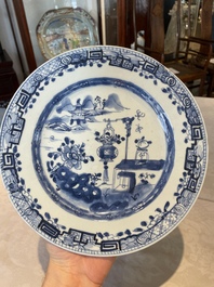 A group of thirteen Chinese blue, white and famille rose plates and a bowl, late Ming/early Qing