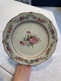 A collection of 22 Chinese famille rose and Imari-style plates, 18th C.