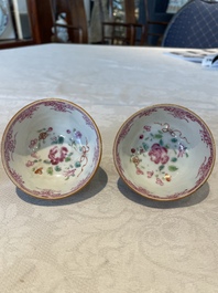 Two Chinese famille rose teapots, ten cups and nine saucers, Qianlong