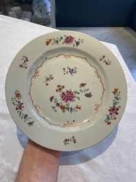 A collection of 22 Chinese famille rose and Imari-style plates, 18th C.