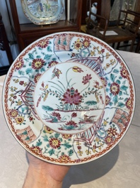 A group of thirteen Chinese blue, white and famille rose plates and a bowl, late Ming/early Qing