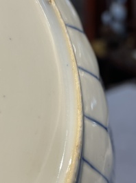 A group of thirteen Chinese blue, white and famille rose plates and a bowl, late Ming/early Qing