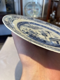 A group of thirteen Chinese blue, white and famille rose plates and a bowl, late Ming/early Qing