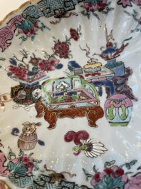 A Chinese famille rose black-ground teapot with cover and stand and a sauce boat, Qianlong