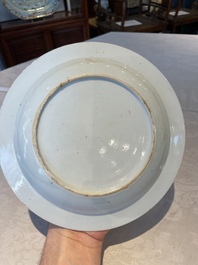 A group of thirteen Chinese blue, white and famille rose plates and a bowl, late Ming/early Qing
