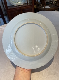 A group of thirteen Chinese blue, white and famille rose plates and a bowl, late Ming/early Qing