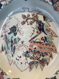 A group of thirteen Chinese blue, white and famille rose plates and a bowl, late Ming/early Qing