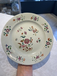 A collection of 22 Chinese famille rose and Imari-style plates, 18th C.