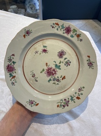 A collection of 22 Chinese famille rose and Imari-style plates, 18th C.