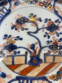 A group of thirteen Chinese blue, white and famille rose plates and a bowl, late Ming/early Qing