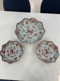A Chinese famille rose lotus-shaped dish and two plates, Qianlong