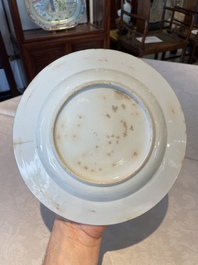 A group of thirteen Chinese blue, white and famille rose plates and a bowl, late Ming/early Qing