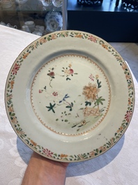 A collection of 22 Chinese famille rose and Imari-style plates, 18th C.