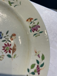 A collection of 22 Chinese famille rose and Imari-style plates, 18th C.