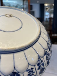 A group of thirteen Chinese blue, white and famille rose plates and a bowl, late Ming/early Qing